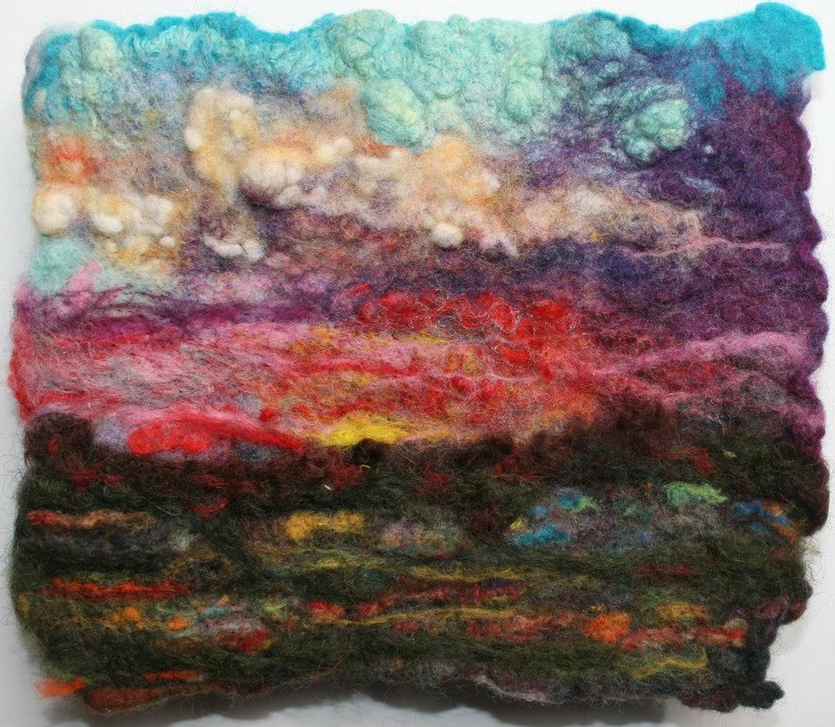 felted Flint Hills landscape with colorful sky
